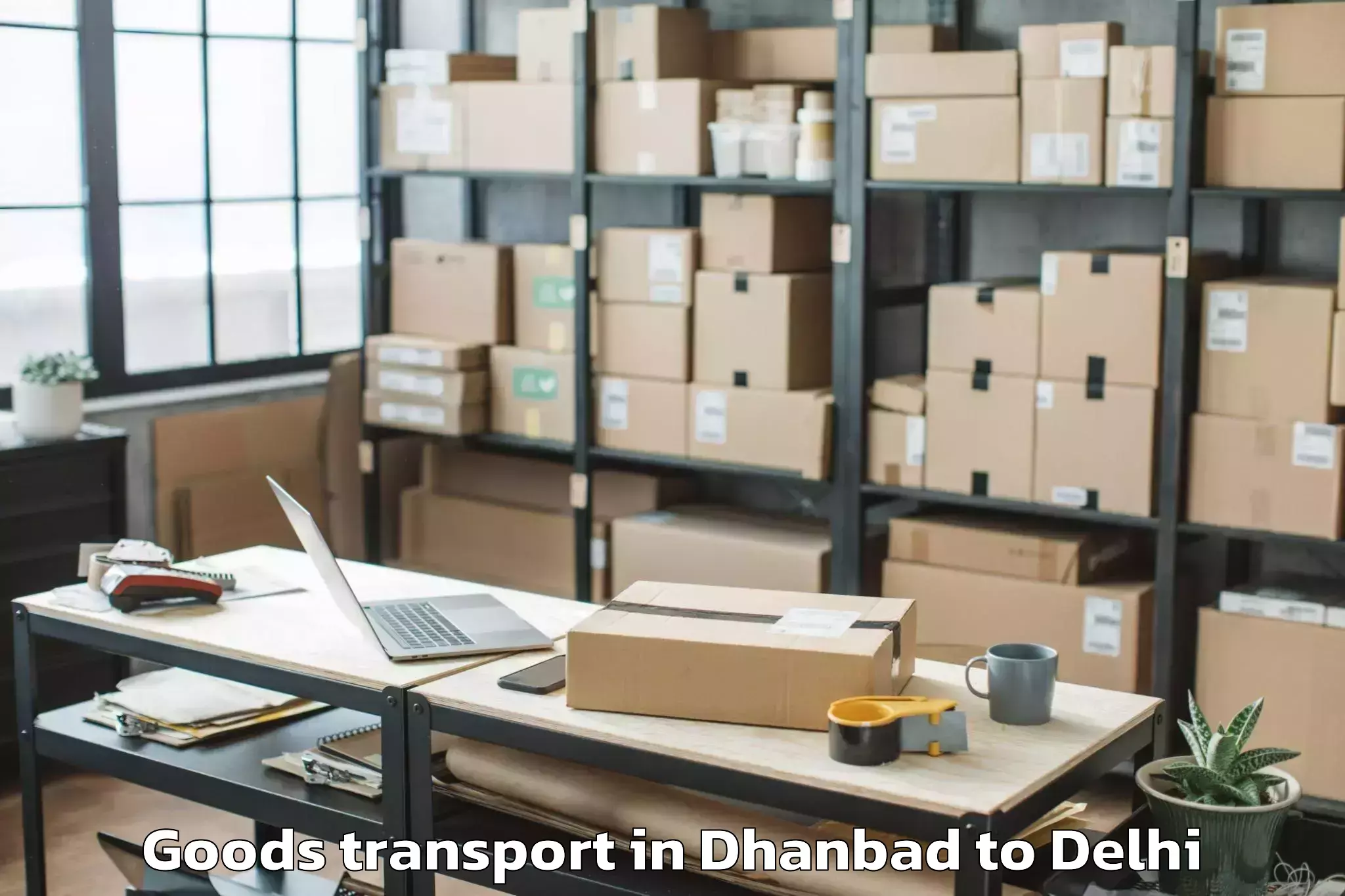 Trusted Dhanbad to Indira Gandhi International Ai Goods Transport